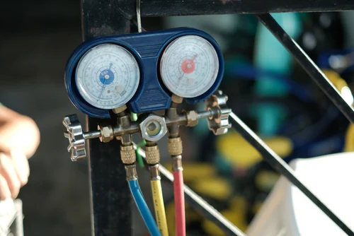 Service Line Air & Heat technician diagnosing and solving complex AC and heating repair problems in Baytown, TX.