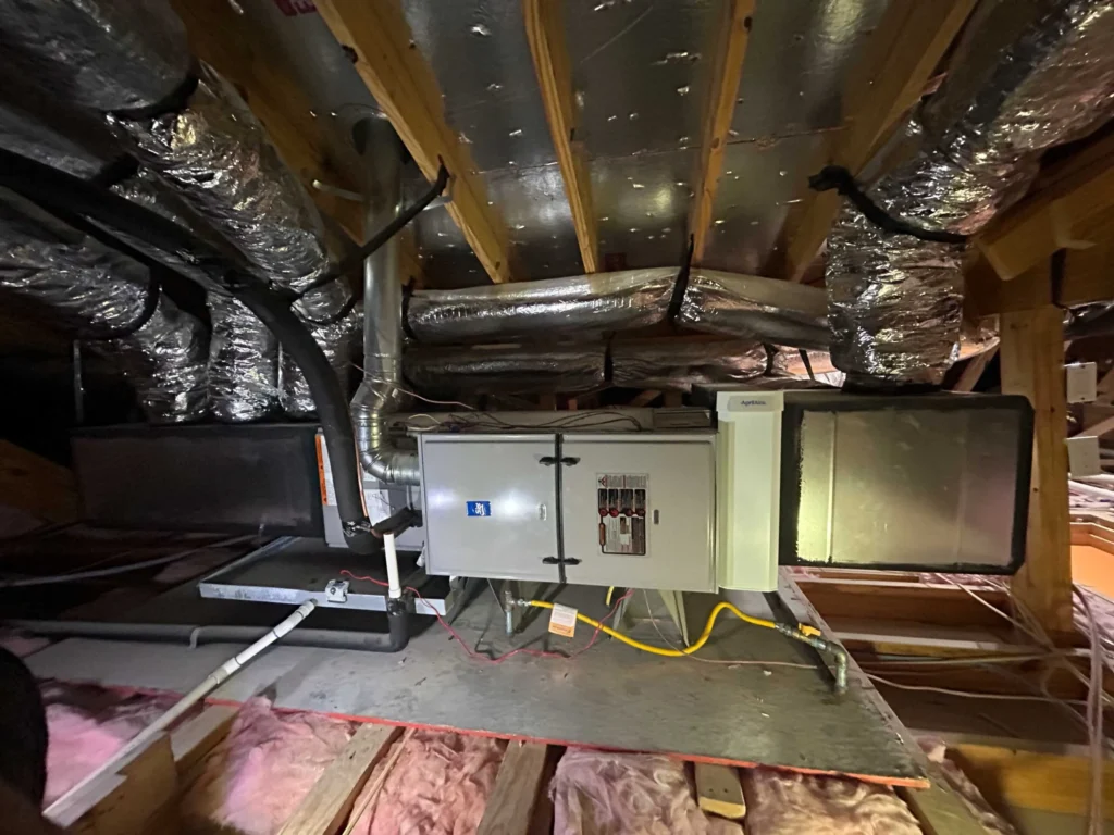 Custom sheet metal HVAC fabrication and new construction installation demonstrating built not bought quality in Baytown, TX.